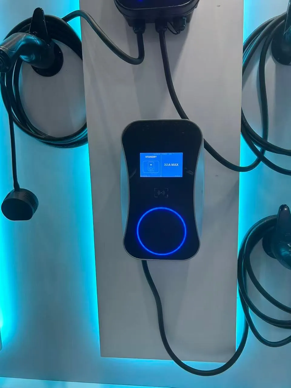 Wallbox with LCD screen on the VULTAE showroom wall